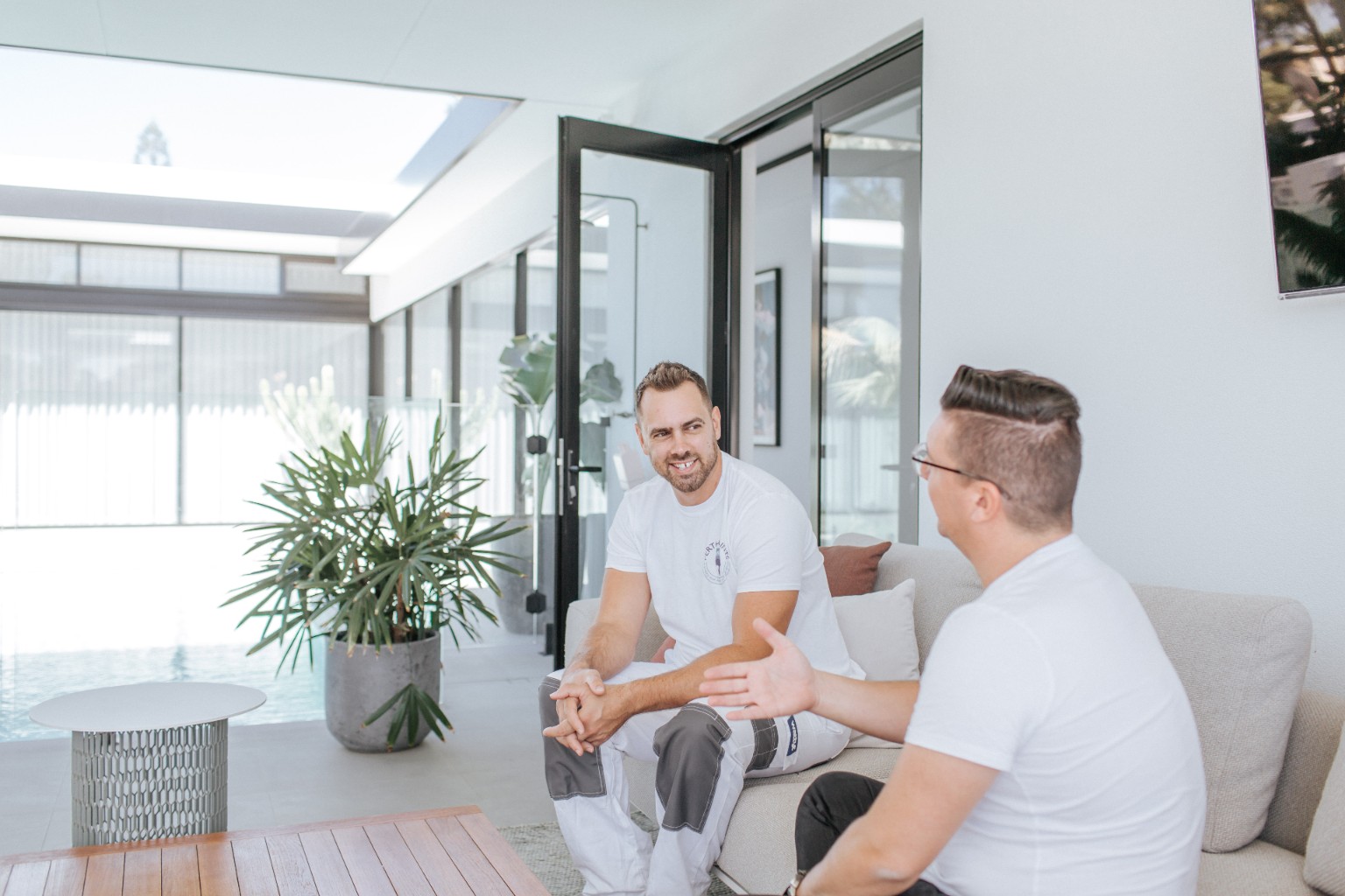Corey Hicks discussing painting options with a homeowner